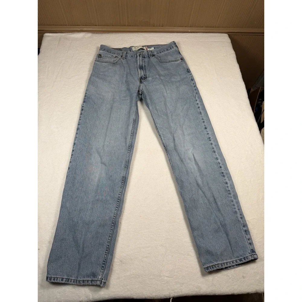 Vintage Levi's 550 Relaxed Fit Jeans Men's Fits 32x30 Light Wash Denim Blue